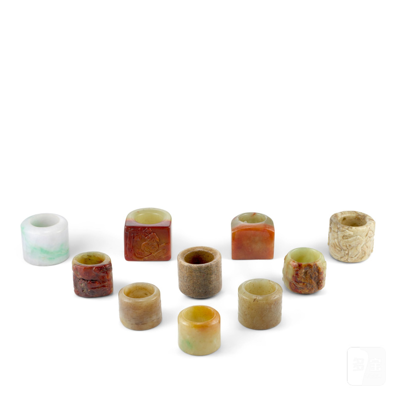 清及更晚 玉及石料扳指十枚 | A GROUP OF TEN JADE AND HARDSTONE ARCHER'S RINGS